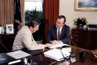 Vice President George H.W. Bush, right, meets with President Reagan, left, in Oval Office, 1984.