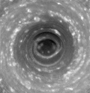 Picture of a large hurricane-like storm on the south pole of Saturn