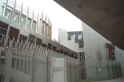 Bilingual signs in English and Gaelic are now part of the architecture in the Scottish Parliament building completed in 2004.