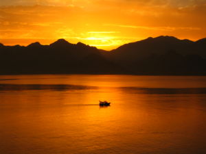 Mediterranean Sea on the coast of Antalya, Turkey at sunset.