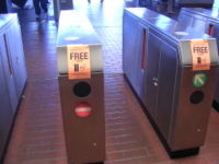 Ticket gates with the signature red triangular doors retracted