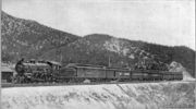 Santa Fe's California Limited pauses at the summit of Cajon Pass in 1908.