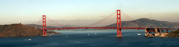 Characteristic coloration for smog in California in the beige cloud bank behind Golden Gate Bridge