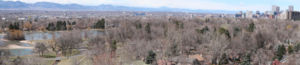 Washington Park set against the background of the cascading Rocky Mountains west of town.