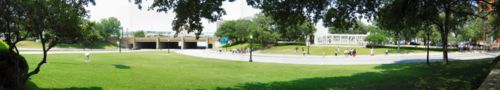 Dealey Plaza, with Elm Street on the right - and the underpass in the middle. The last shot struck JFK´s head in front of the white pergola building on the right, and in the position between the street lamps on either side of the street.