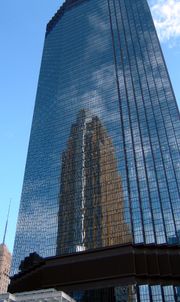 The IDS Tower, designed by Philip Johnson and Minnesota's tallest building, reflecting César Pelli's Art Deco-style Wells Fargo Center