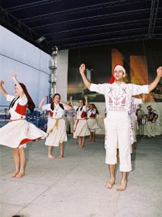 Camisola Poveira, used by men, during a Poveiro folklore show in Passeio Alegre Square.