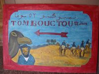 A sign in the Sahara about the distance to Timbuktu in caravan