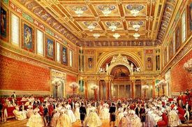 The State Ballroom is the largest room at Buckingham Palace. It was added by Queen Victoria and is used for ceremonies such as investitures and state banquets. This picture dates from 1856. The polychrome colour scheme has been replaced by mainly white decoration with gold details and red upholstery.