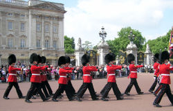 Guards march out of Buckingham Palace at the end of the daily Changing of the Guard ceremony.