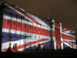 Buckingham Palace with the Union Flag projected onto it for Christmas Eve 2003