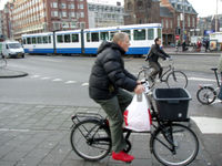 A few of the ubiquitous cyclists in Amsterdam