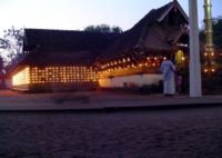 Most larger Keralite Hindu temples have outer walls affixed with arrays of oil lamps, which devotees light as part of their evening prayers.