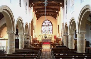 The interior of the church of Bourne Abbey, where the Ormulum was composed: the two nave arcades, though now unpainted, remain from the church Orm would have known.