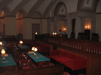 The Supreme Court met in this windowless chamber in the United States Capitol from 1819 until 1860.  The room has been restored, and is now preserved as the Old Supreme Court Chamber.