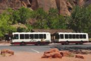 From April through October, the scenic drive in Zion Canyon is closed to private vehicles, and visitors ride the frequent shuttle buses