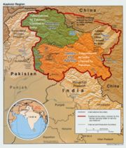 Shown in green are the regions Northern Areas and Azad Kashmir, under Pakistani administration. The buff-coloured region is Jammu and Kashmir (including Ladakh) under Indian administration, while the beige-and-khaki striped region is Aksai Chin, under Chinese administration.