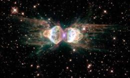 The Ant planetary nebula. Ejecting gas from the dying central star shows symmetrical patterns unlike the chaotic patterns of ordinary explosions.