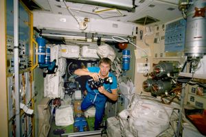 Cosmonaut Sergei Krikalev inside the Zvezda Service Module, November 2000