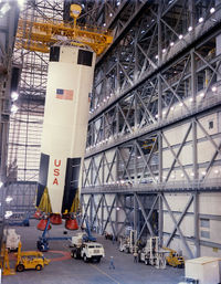 The first stage of AS-503 being erected in the VAB on February 1, 1968