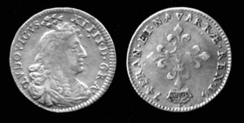 Silver coin of Louis XIV, dated 1674.The inscription in Latin on the obverse reads "LVDOVICUS XIIIID[EI] GRA[TIA]" and on the reverse "FRAN[CIA] ET NAVARRAE REX" (translated into English as "LOUIS XIIII (Louis XIV), BY THE GRACE OF GOD, KING OF FRANCE AND OF NAVARRE").