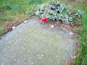 "Today there were 18 1p coins on the grave of Ludwig Wittgenstein at the Parish of the Ascension Burial Ground in Cambridge. Originally — some days ago — there were four, spread about; and then five in a little pile to one side. This morning there were 15 neatly underlining his name. Now there are three more, still neatly lined up. Over the years numerous small objects have been placed on the grave including a lemon, a pork pie, a Mr Kipling cupcake and a Buddhist prayer wheel. It is all very intriguing." (Letter to the editor from Nick Ingham, The Times, September 3, 2001) 