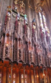 Swords, helms and crests of Knights of the Thistle above their stalls in the Thistle Chapel